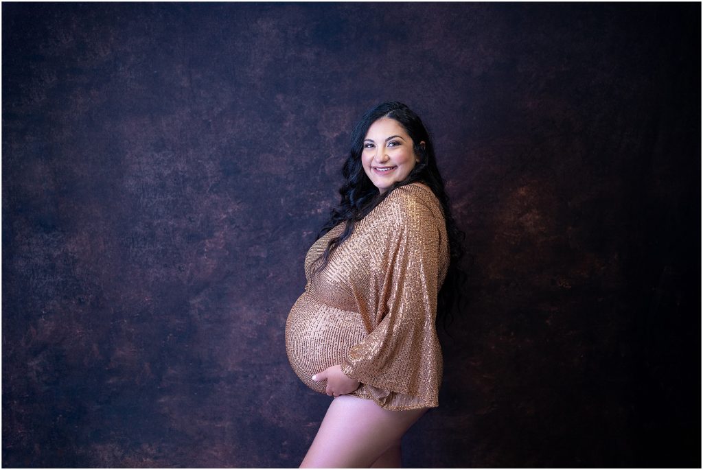 maternity photo in gold bodysuit