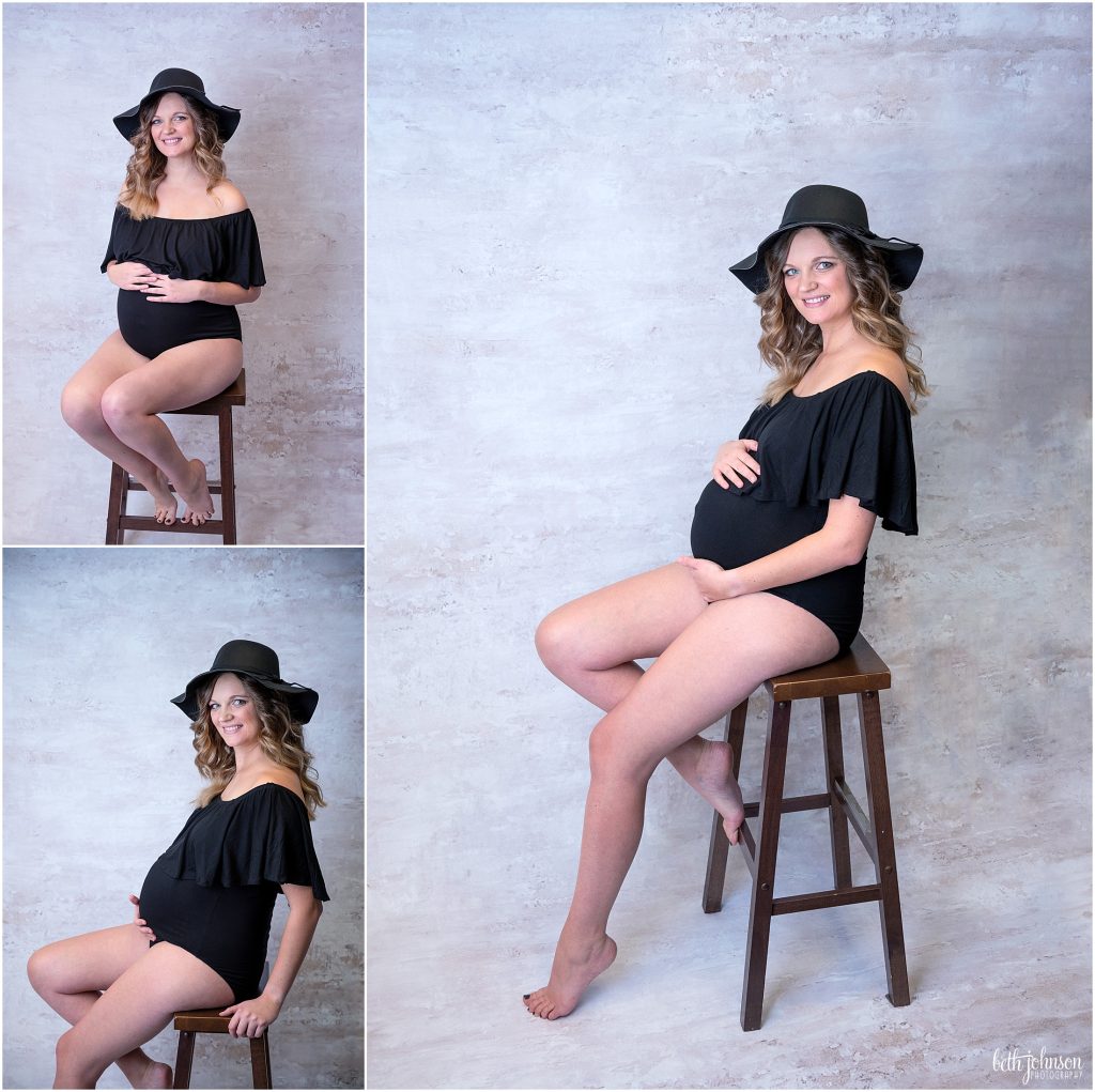 black bodysuit hat maternity portrait