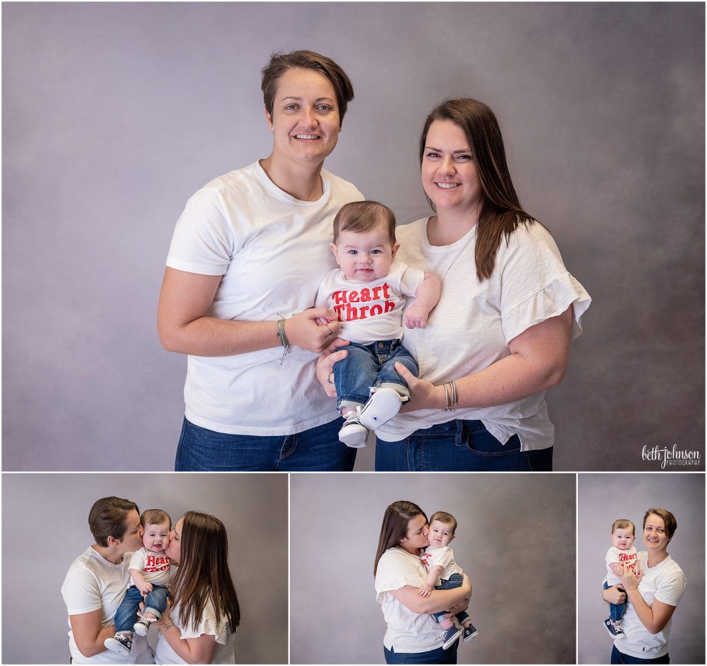 parents holding 8 month old baby boy