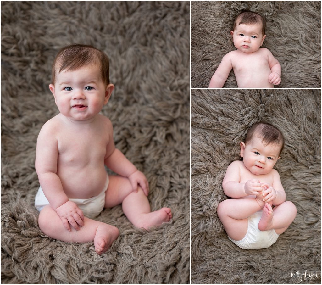 baby sitting up on flokati rug