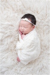 white flokati swaddle and tieback image