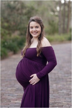 pregnant mom in purple long sleeve dress