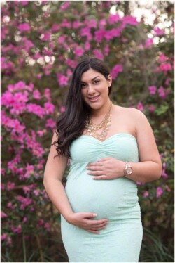 pregnancy photo in front of flowers