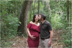 dad kissing moms cheek maternity photo