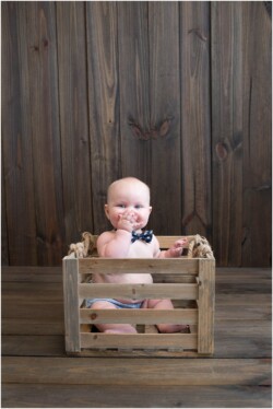 baby boy blowing kisses