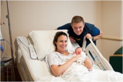 parents and baby in hospital after birth