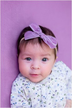 3 month old baby girl on purple blanket